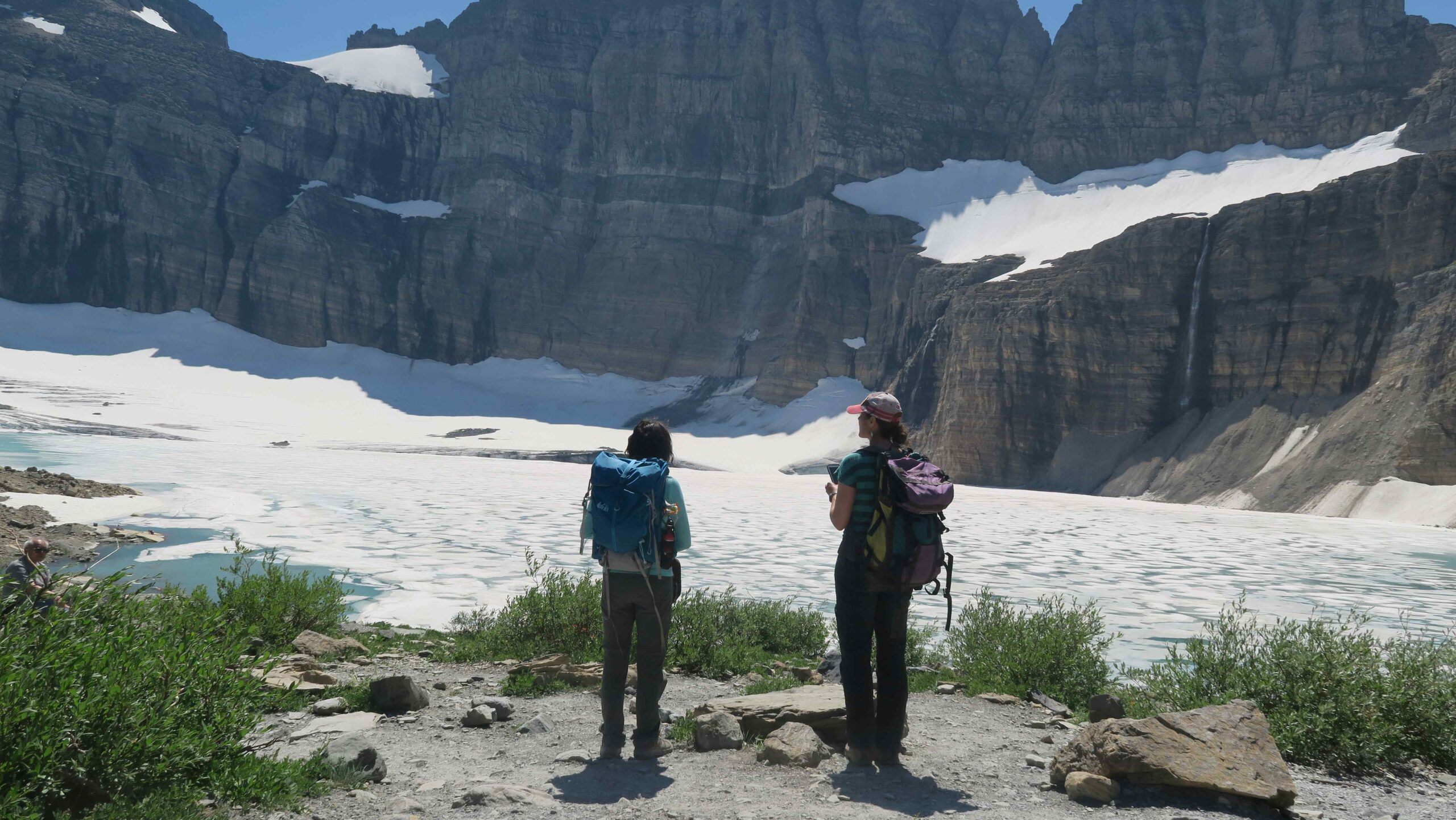 Geology Professor Kelly MacGregor and Macalester graduate Heidi Anderson ’14 take in the views at Glacier National Park.