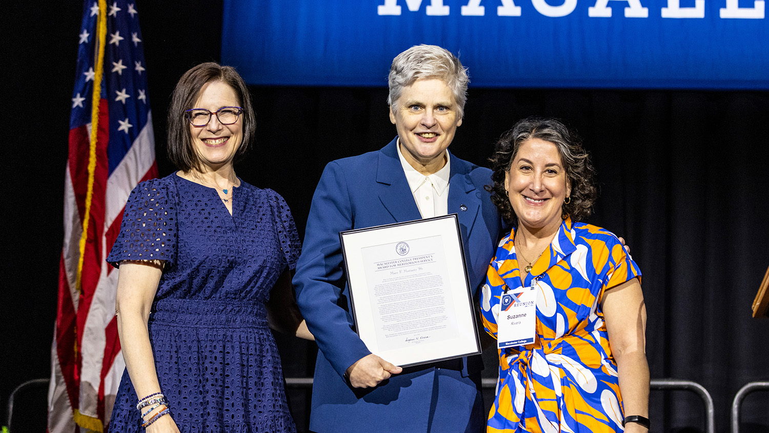 Mary F. Moriarty ’86 poses with President Rivera and Alumni Board President Julie Bailit ’93 as she receives the 2026 President’s Award for Meritorious Service.