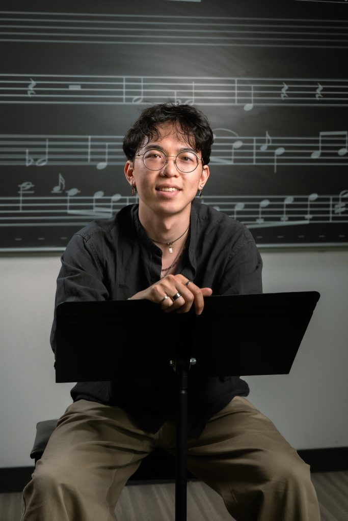 Music major Max Chang ’27 poses for a photo.