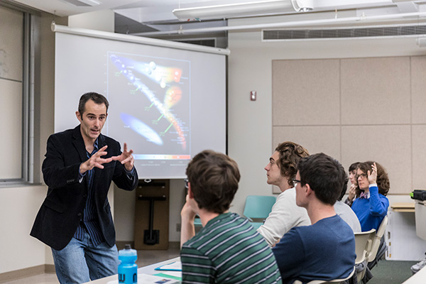 Professor teaching a physics class