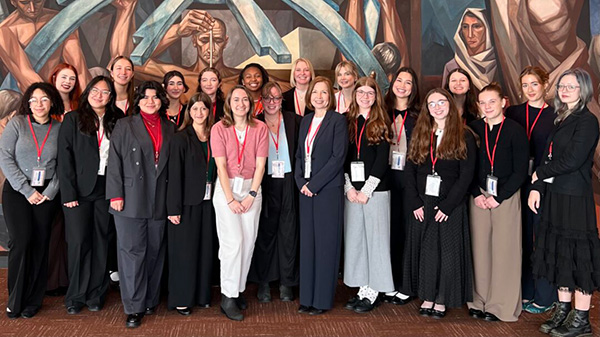 Group of students stands in United Nations building