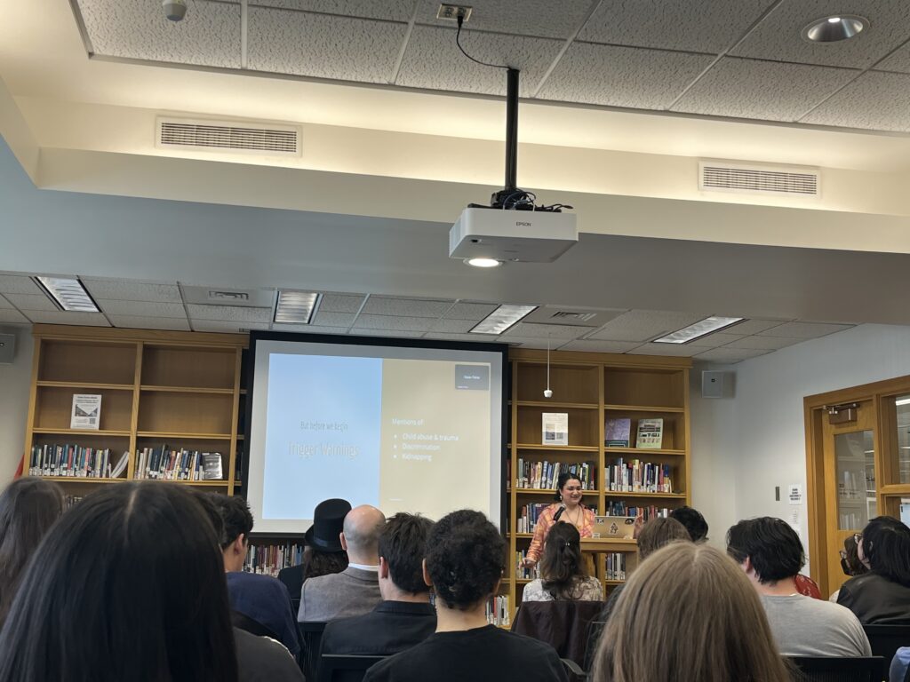 Kaliana Andriamananjara presenting in the Harmon Room