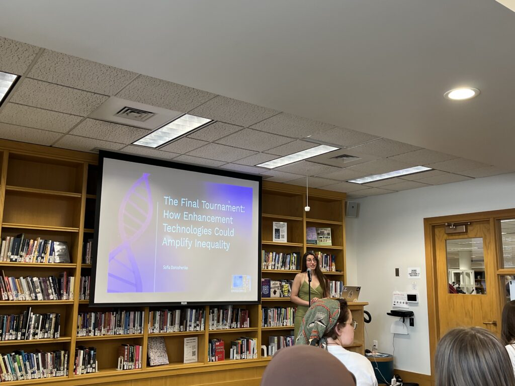 Sofia presents at the front of the Harmon Room