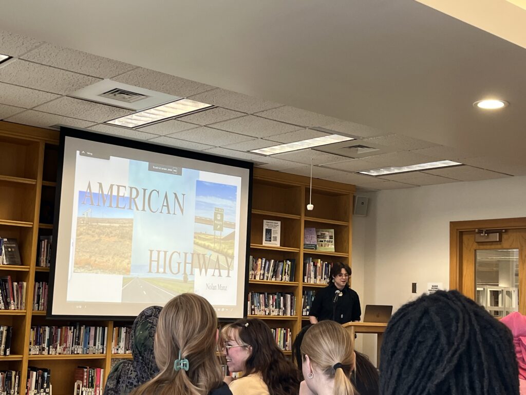 Nolan presents at the front of the Harmon Room