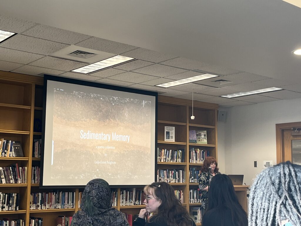 Leila presents at the front of the Harmon Room