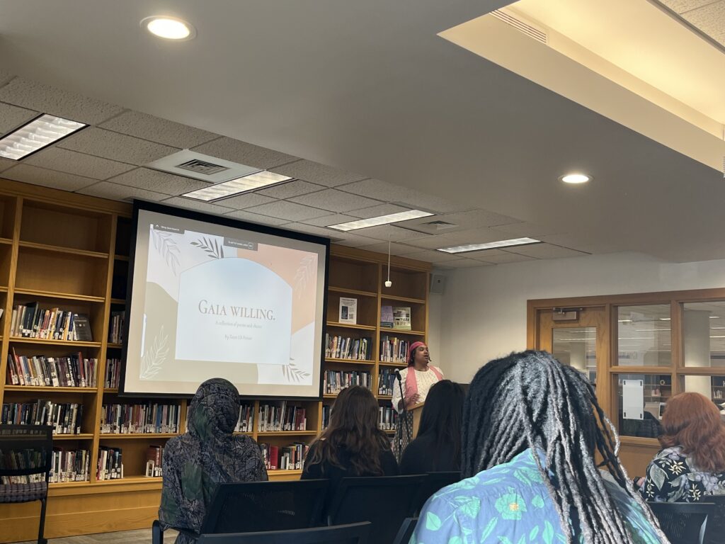 Zeam presents at the front of the Harmon Room