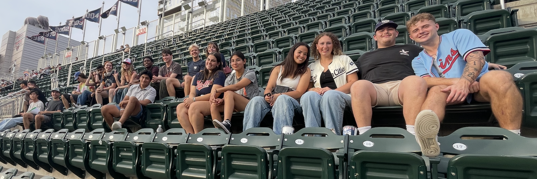Students from Matt Burgess's baseball class in the stands at a Twins game.