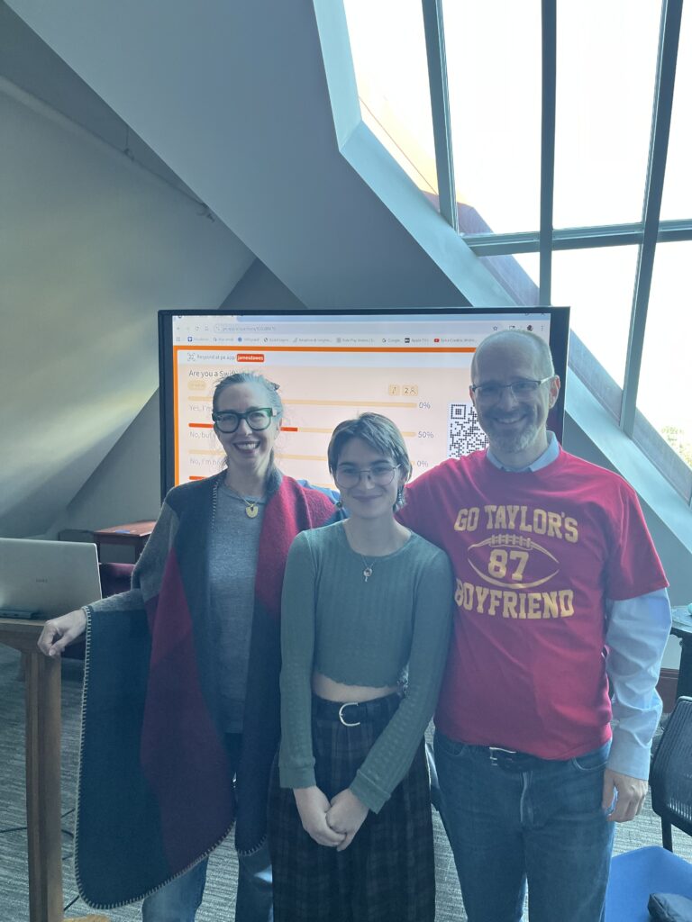 Taylor Swift Lit Salon creators posing before the event starts in the Old Main Lounge