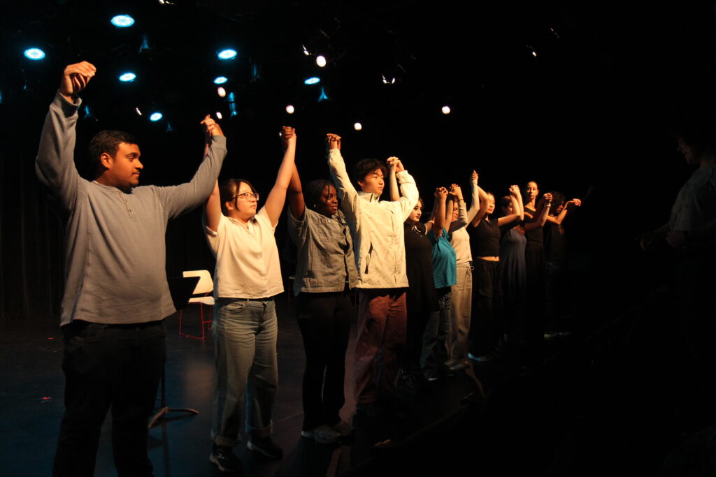 Performers bowing after MacFest plays