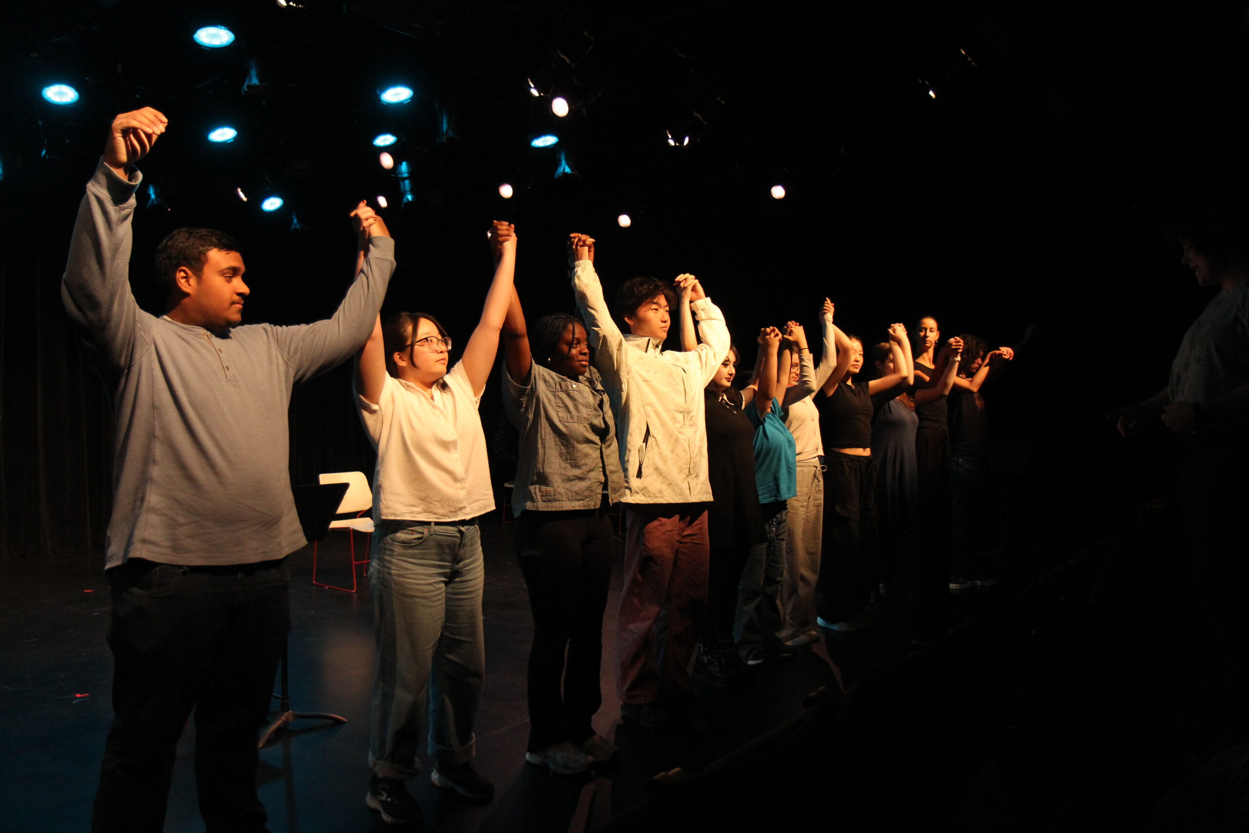 Performers bowing after MacFest plays