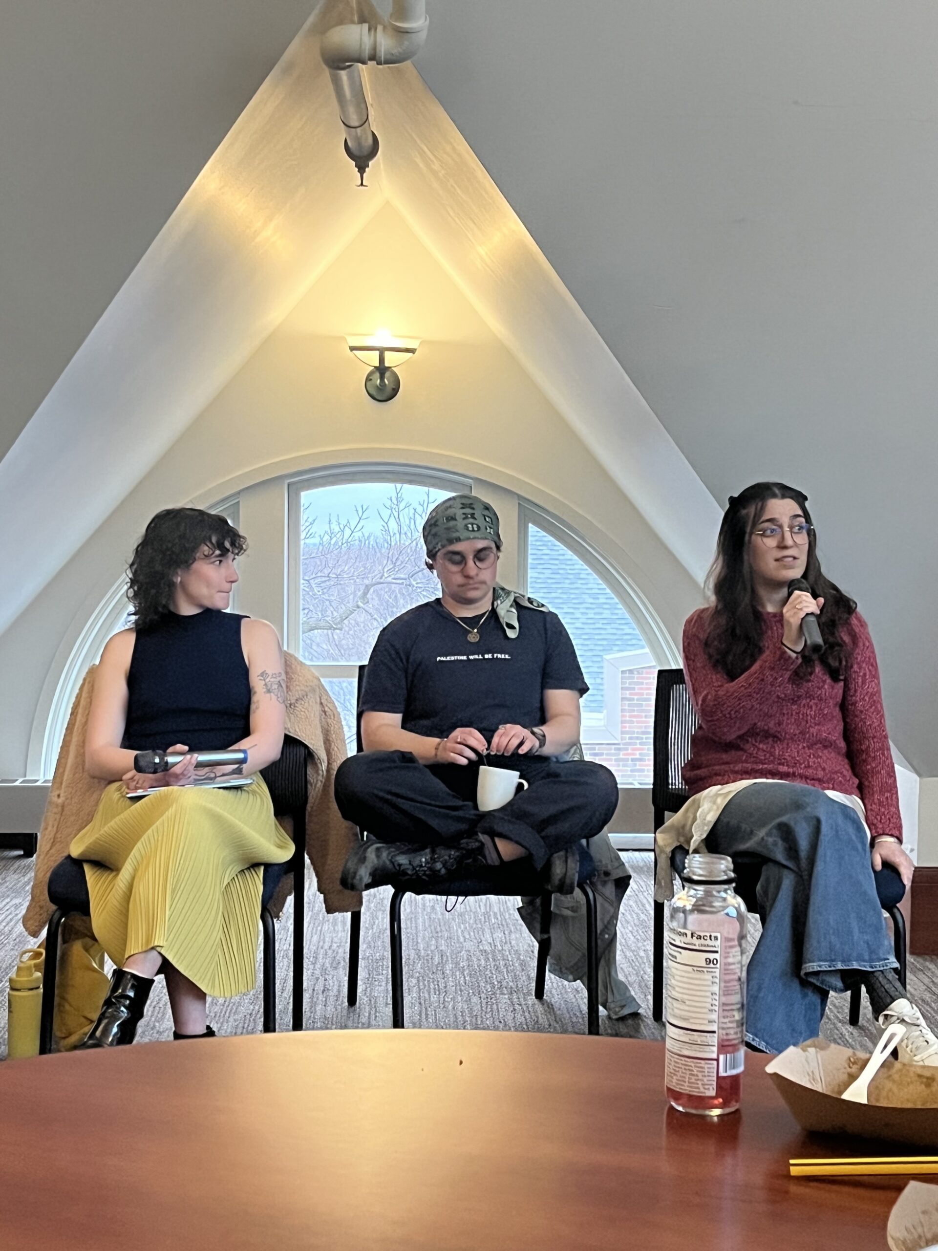 Alums sitting in Old Main 4 for the panel