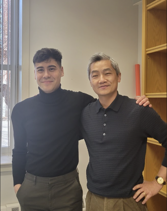 Professor Michael Prior posing with poet Hai-Dang Phan