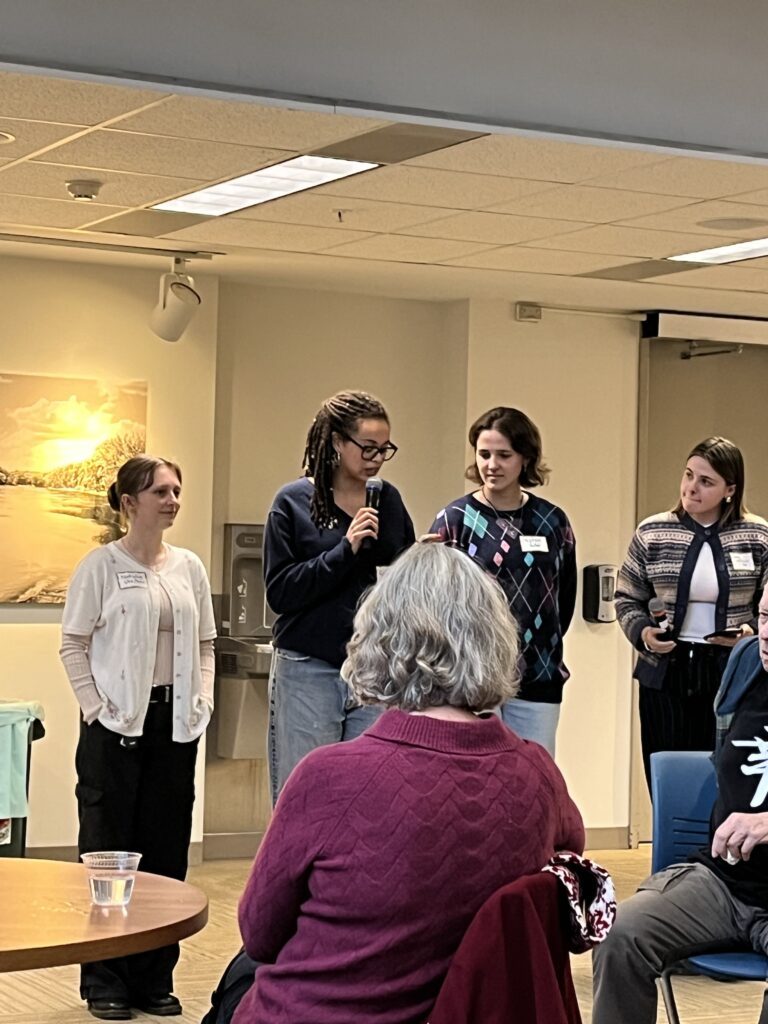 Natalie, Rabi, Peyton, and Lucy stand in a line to start the introductions to Apps and Alums.