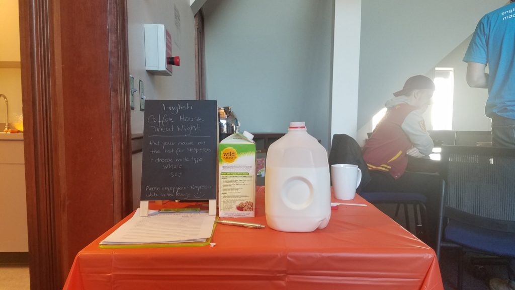 Milk and a cute sign for espresso signups