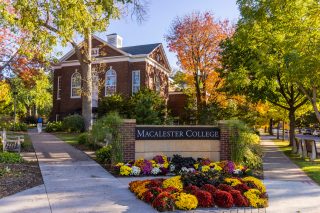 Macalester campus in the fall, with buildings and trees surrounded by colorful foliage.